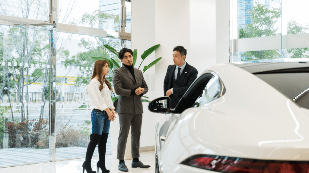 Couple with a car dealer for car rent