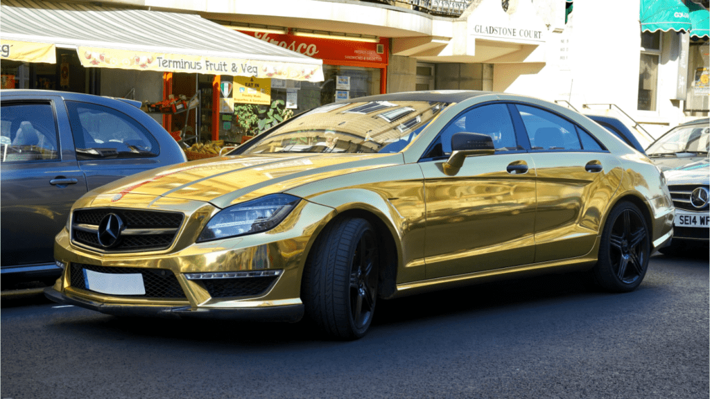 Gold mercedes-benz sedan